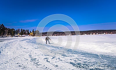 Falun - March 30, 2018: A newbie ice skater at the resort of Framby Udde near the town of Falun in Dalarna, Sweden Editorial Stock Photo