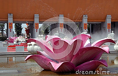 Famen Temple, Shaanxi Province, China: A fountain designed like a pink lotus flower at the entrance gate to the new complex Editorial Stock Photo