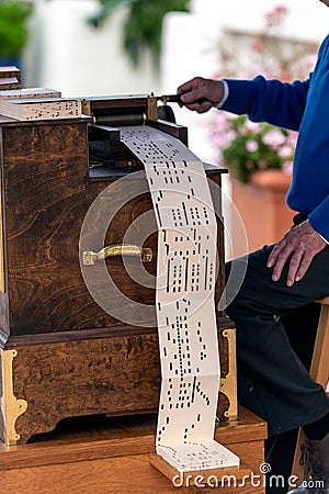 Familiar songs played by old fashioned box Stock Photo