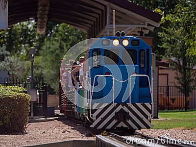 Families enjoying a ride at the McCormick-Stillman Railroad Park in Scottsdale, Arizona Editorial Stock Photo