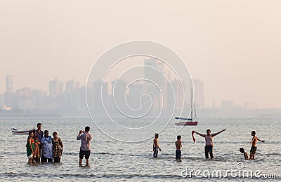 Families enjoying the sea, Chowpatty Beach, Mumbai, India Editorial Stock Photo