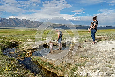 Families and kids enjoying Wild Willy`s Hot Spring Editorial Stock Photo