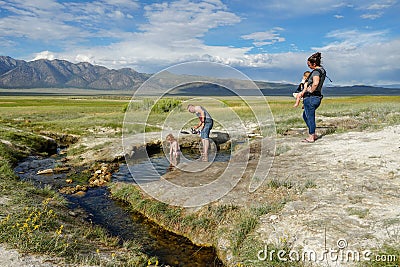 Families and kids enjoying Wild Willy`s Hot Spring Editorial Stock Photo