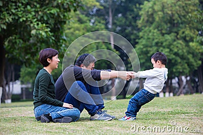 Families play on the grassland Stock Photo