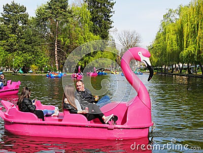 Families spend quality time on pleasure boats on the lake Editorial Stock Photo