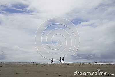 Families were playing on Ocean Shores Editorial Stock Photo