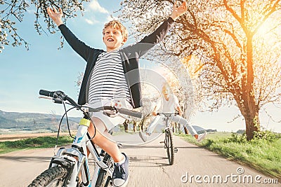 Family active leisure - father and son have a fun when they ride Stock Photo