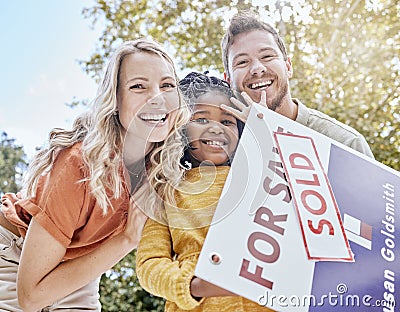 Family, adoption and homeowner with a girl and foster parents holding a sold sign in their garden or yard. Portrait Stock Photo