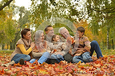 Family in autumn forest Stock Photo