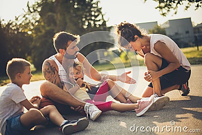 Family at basketball sometimes have injures. Stock Photo