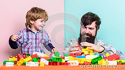 Family is Best. small boy with dad playing together. happy family leisure. father and son play game. building home with Stock Photo
