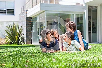 Family in big house Stock Photo