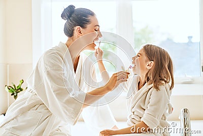 Family are brushing teeth Stock Photo