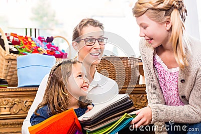 Family buying supplies in handicraft store Stock Photo