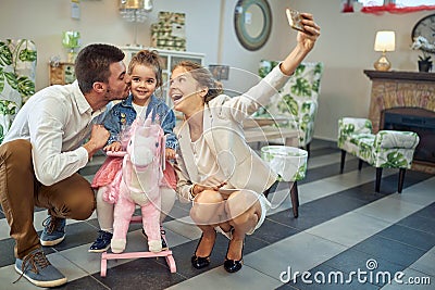 Family captures fun moments amongst lighting Stock Photo