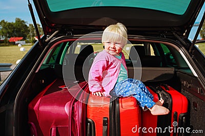 Family car travel - little baby and suitcases packed Stock Photo