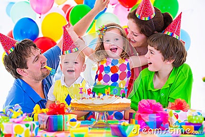 Family celebrating birthday party Stock Photo