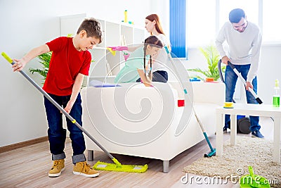 Family cleaning house Stock Photo