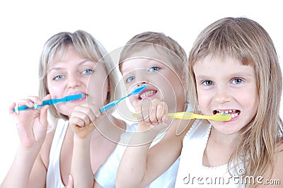 Family cleaning teeth Stock Photo