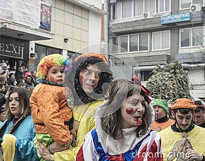 Family in colorful clown costume during the annual Carnival in Greece Editorial Stock Photo