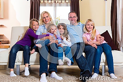 Family on a couch Stock Photo