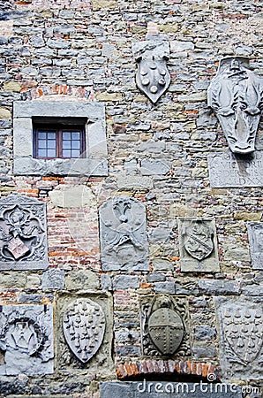 Family Crests on Stone Wall Stock Photo