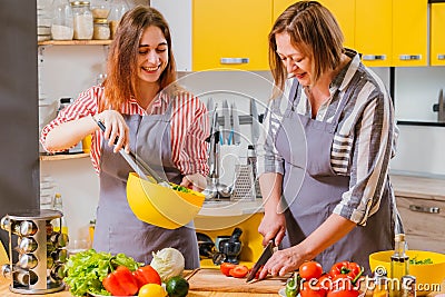 Family culinary master class kitchen vegetables Stock Photo