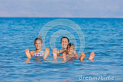 Family At The Dead Sea, Israel. Stock Photo