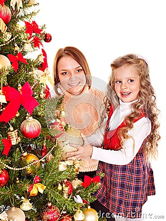 Family decorate Christmas tree. Stock Photo