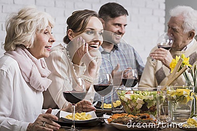 Family dinner with wine Stock Photo