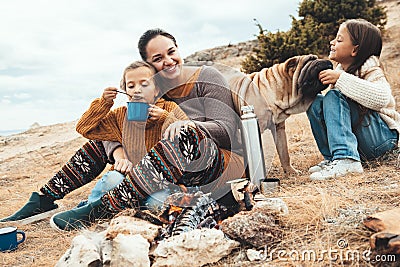 Family with dog in autumn hike Stock Photo