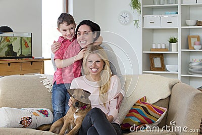 Family with dog at home Stock Photo