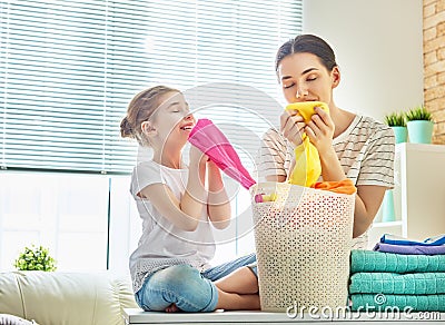 Family doing laundry at home Stock Photo