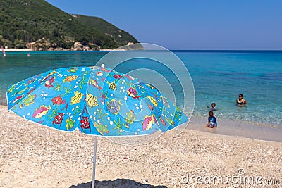 Family enjoying the beach in Lefkada, Greece Stock Photo