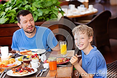 Family enjoying breakfast Stock Photo