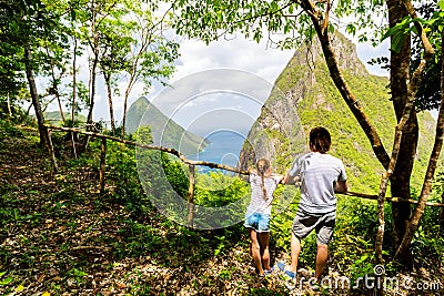 Family enjoying view of Piton mountains Stock Photo
