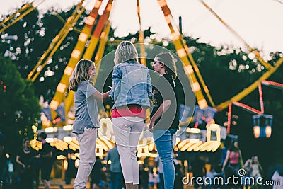 Family at the festival in the Munich Olympic Park in the evening Editorial Stock Photo