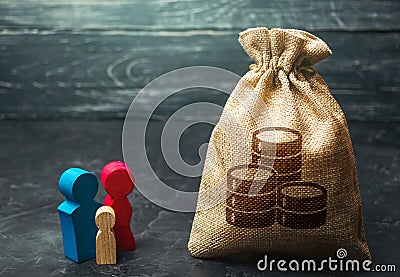 Family figurines near the money bag. Social assistance and support. Income level, budget. High debt. Segmentation. Marketing and Stock Photo