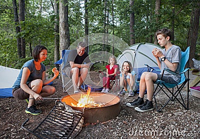 Family of five camping Stock Photo