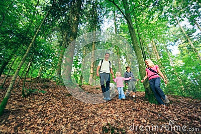 Family Of Four Hiking Stock Photo