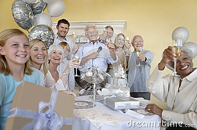 Family And Friends Toasting Champagne Stock Photo