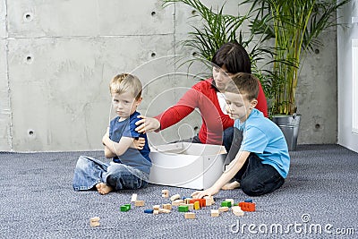 Family fun with cleaning up Stock Photo