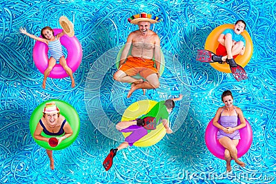 Family fun in the swimming pool in summer Stock Photo