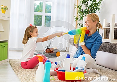 Family funny moments when cleaning home Stock Photo