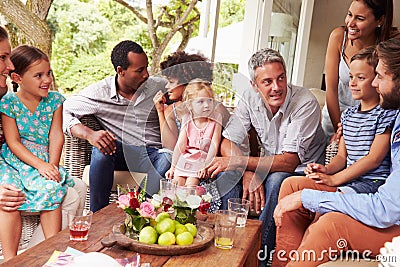 Family gathering in a conservatory Stock Photo