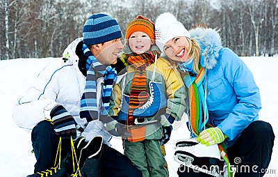 Family going ice skating Stock Photo