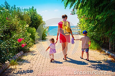 Family going to sea beach on summer vacation Stock Photo