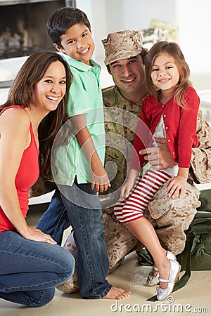 Family Greeting Military Father Home On Leave Stock Photo