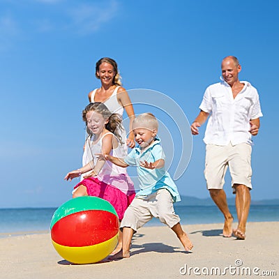 Family Have Fun on the Beach Stock Photo