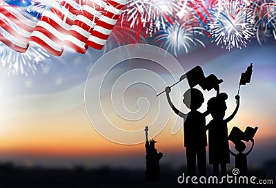 Family holding american flag with fireworks Stock Photo